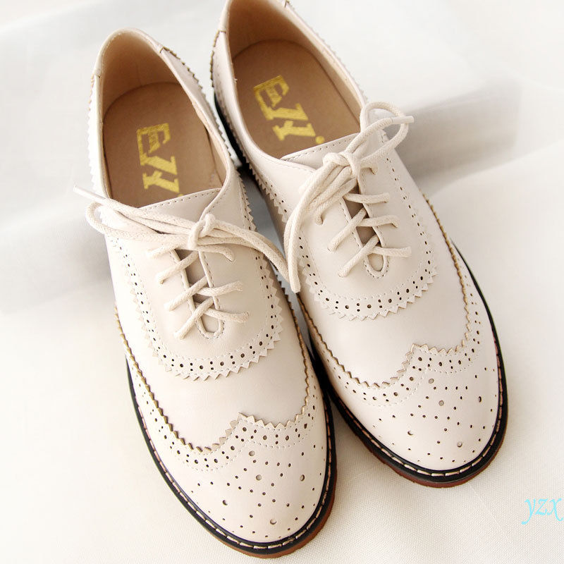 pink and white oxford shoes