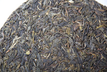 Jerry tea 357g puer tea raw tea handmade and suppressed by stone mill Qi zi cake