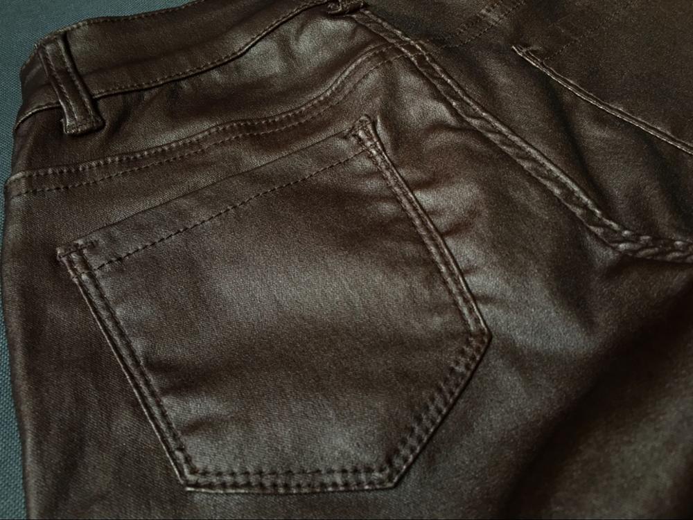 brown coated jeans