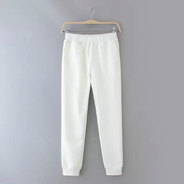 white sports trousers