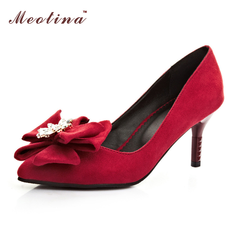 red stilettos with bow