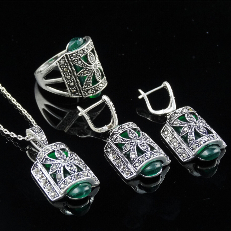 http://g01.a.alicdn.com/kf/HTB1BMQEHFXXXXbfXVXXq6xXFXXXk/Unique-Design-Antique-Silver-Plated-Green-Resin-Stone-Fashion-Vintage-Jewelry-Set-With-Necklace-Earring-Ring.jpg