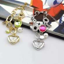 Wh007 moda pendiente de la pulsera del corazón cara del análogo de cuarzo de la muchacha de la muñeca de la gema catenaria de la mano del reloj para mujer relojes de primeras marcas