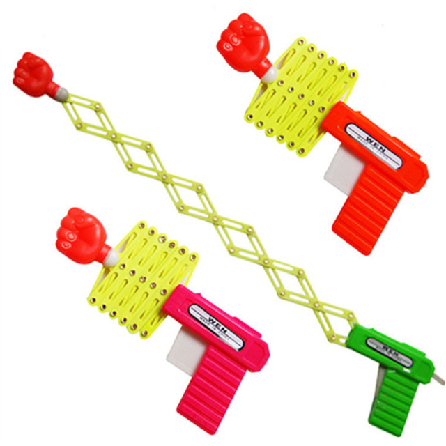 six-quarter-spring-fist-gun-Nostalgic-children-toy-gun-wacky-Mini-fist-creative-telescopic-elastic-spring.jpg_640x640.jpg