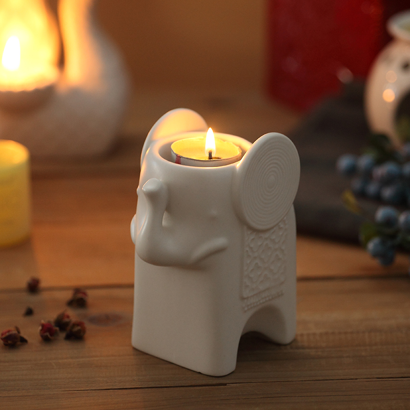 Compra candelabros elefante online al por mayor de china ...