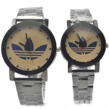 Nuevo 2015 relojes de moda de los amantes de la marca de lujo de negocios acero completo reloj de cuarzo mujeres rhinestone relojes men & women de pulsera