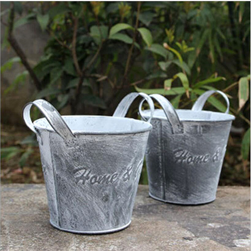 Compra macetas de flores de hojalata online al por mayor de China