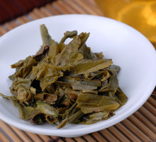 Chinese Yunnan raw Puer Black Tea Pu er Puerh Tea with Teucrium manghuaense leaf Mini Gift