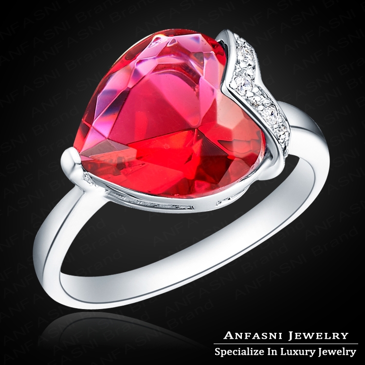 Red heart shaped engagement rings