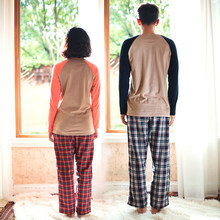 Song Riel autumn cartoon male Ms couple long sleeved plaid pajamas fashion home service package water