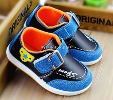 2014 new children’s spring shoes wholesale USES splicing children’s recreational leather shoes The single goose bottom boy shoes