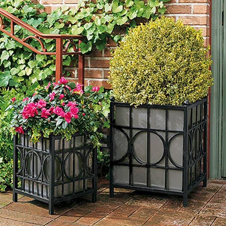 Wrought iron garden flower pots planted flower boxes flower gardening