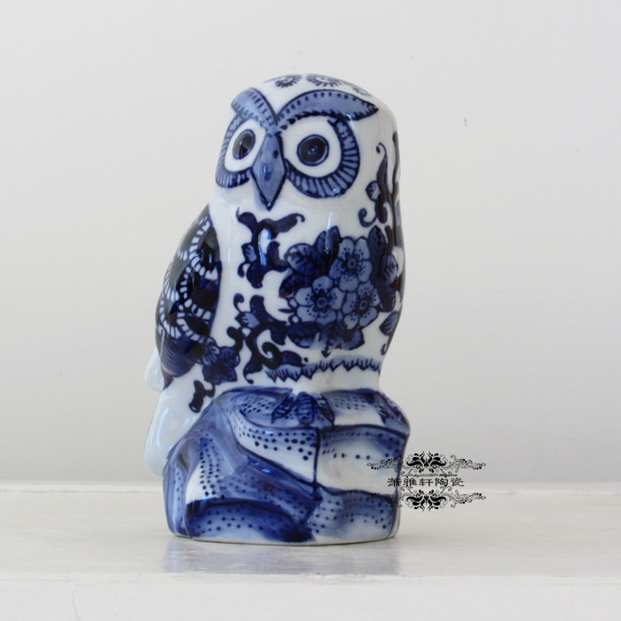 blue and white owl figurine