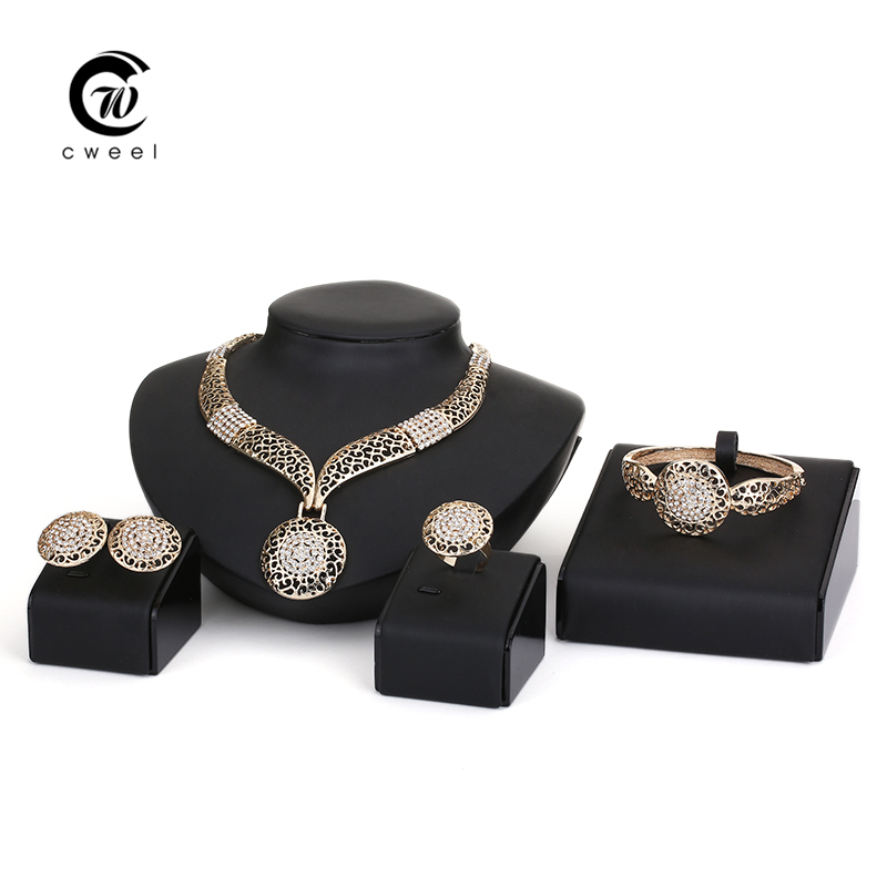 http://g01.a.alicdn.com/kf/HTB1diNBGpXXXXcMaXXXq6xXFXXXp/Crystal-Jewelry-Sets-Fine-African-Beads-Necklace-Bracelet-Earrings-Rings-Set-CZ-Diamond-Wedding-Gold-Plated.jpg