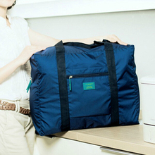 4 Colours New Fashion Travel Pouch WaterProof Unisex Travel Handbags Women Luggage Travel Bag Folding Bags