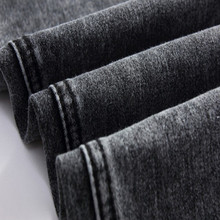 Free shipping 2015 Spring new men s black skinny jeans Fashion slim fit snowflake cowboy feet