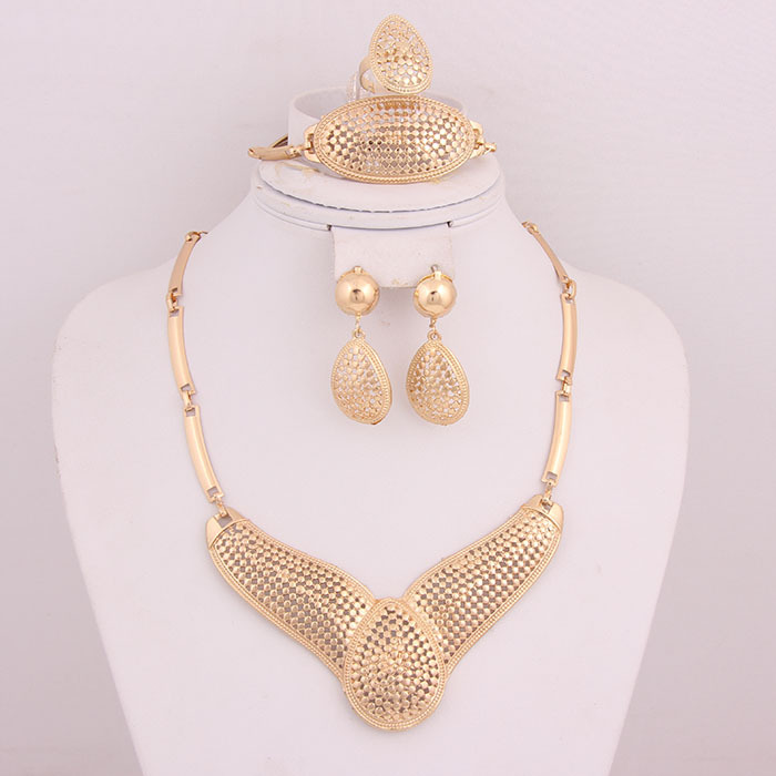 http://g01.a.alicdn.com/kf/HTB1fwVvIFXXXXasXXXXq6xXFXXXq/Vintage-Dubai-Wedding-Hollow-Gold-Plated-African-Costume-Jewelry-Sets-Necklace-Earrings-Ring-Set-For-Women.jpg