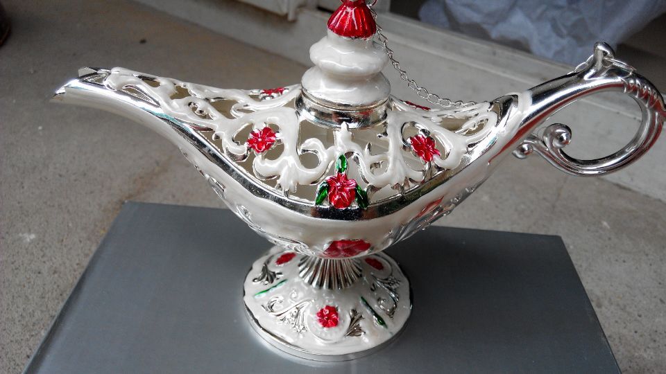 Image: http://g01.a.alicdn.com/kf/HTB1j1czIXXXXXXNXpXXq6xXFXXXL/Beautiful-Collection-Of-Tibet-A-laddin-Genie-font-b-Oil-b-font-font-b-Lamp-b.jpg