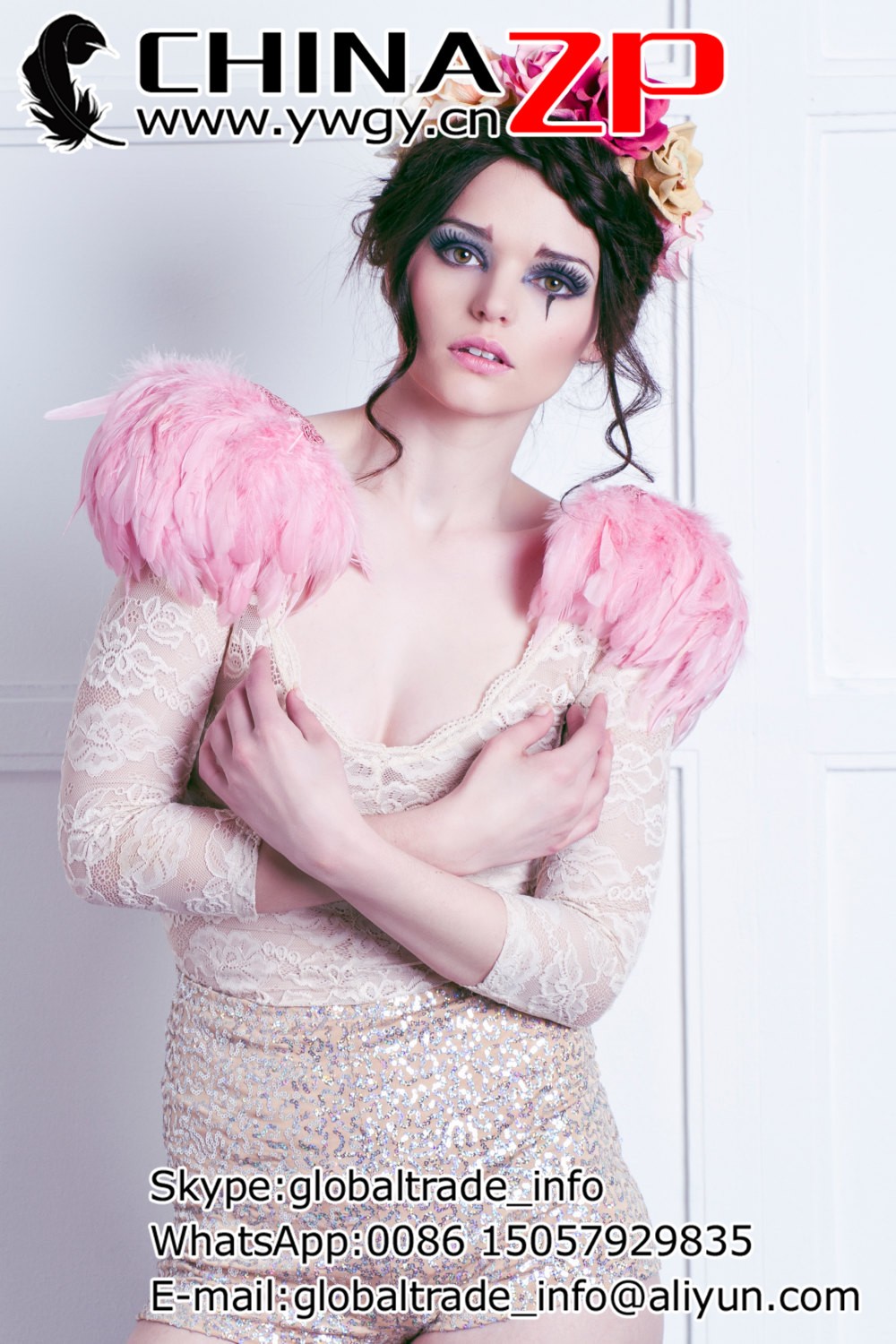 The shoulder pads are made of pink rooster feather trim with a soft felt lining2