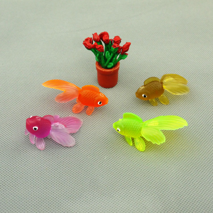 http://g01.a.alicdn.com/kf/HTB1kDubKFXXXXXJXXXXq6xXFXXXI/100pcs-lot-wholesale-5cm-Plastic-fresh-water-fish-model-series-of-ornamental-fish-small-goldfish.jpg