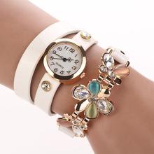 Elegantní dámské hodinky s ozdobným páskem a květinkou z Aliexpress