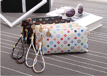 Hot sale 2016 the new mini handbag shoulder bag flowers and stars pattern bag 19*11cm beautiful light PU flap A015