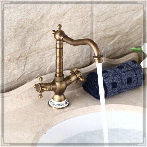 Manija doble de latón antiguo porcelana bronce grifo de la cocina