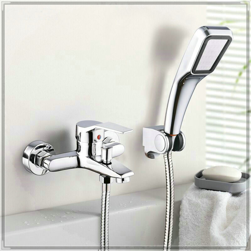 Wall mounted bath mixer with hand shower